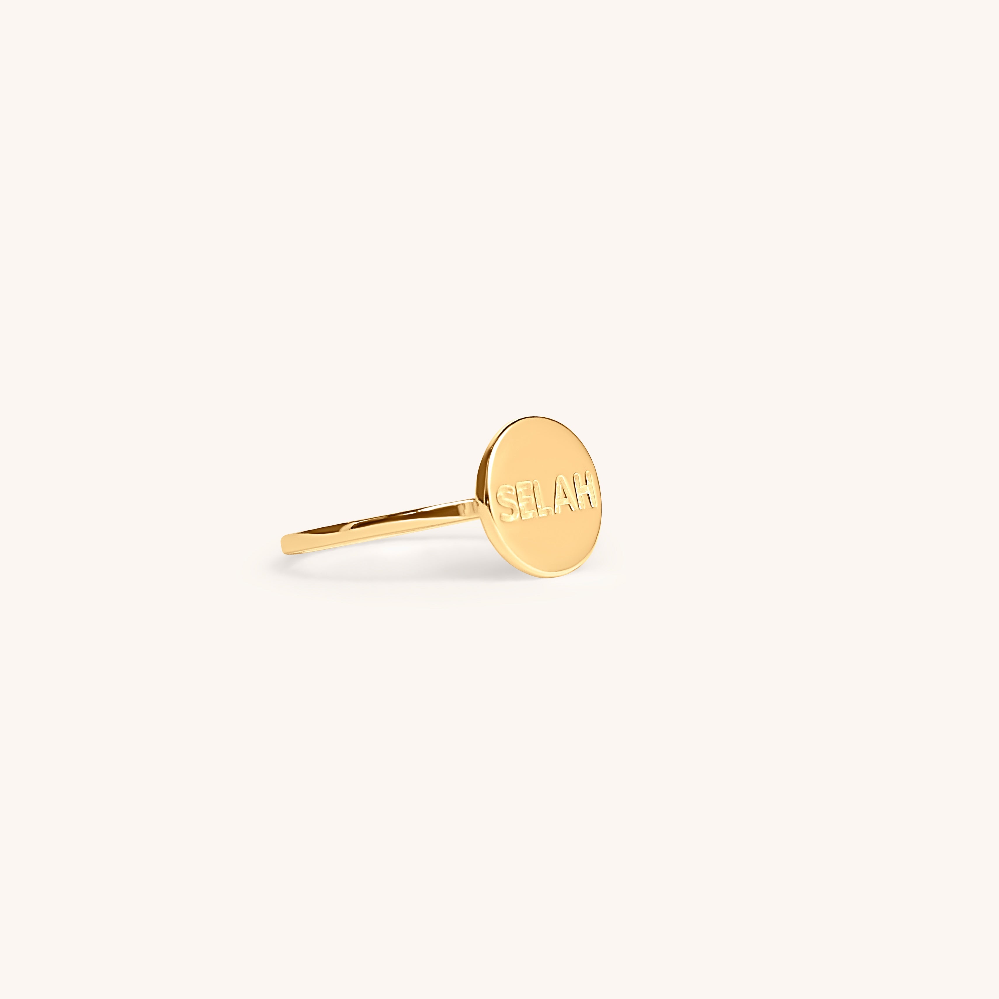 PS46 Jewelry Selah 14K gold ring side view displayed on an off-white background.